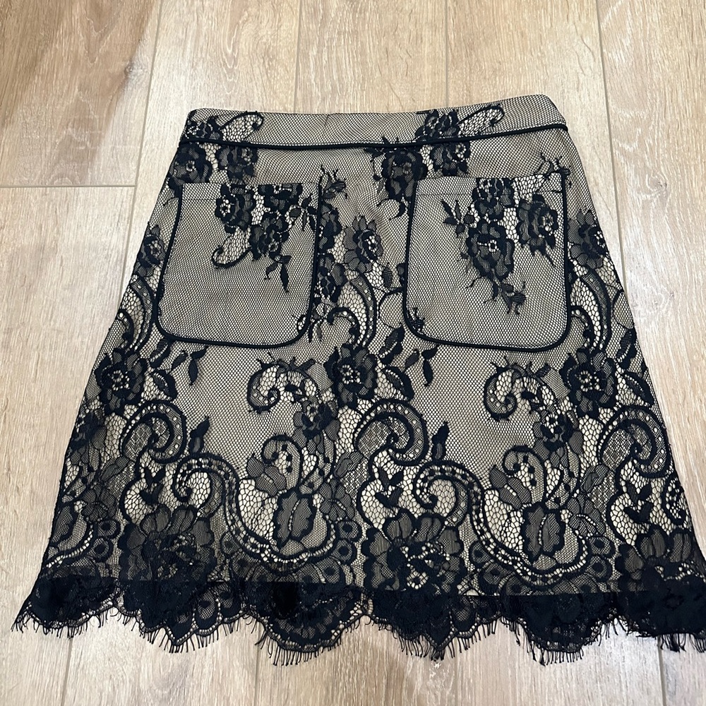 Black lace and nude skirt